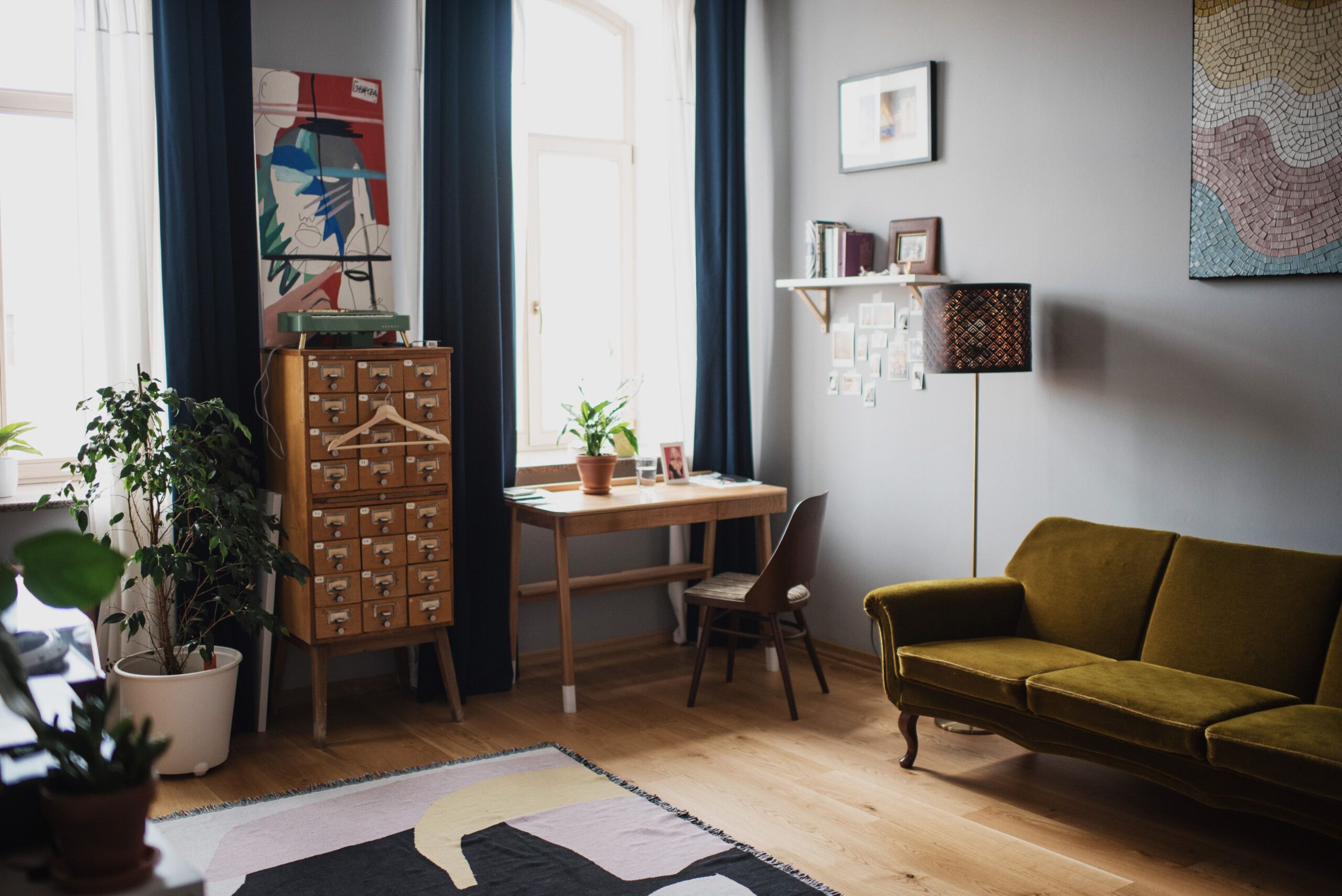Modern interior with wooden floor and cozy sofa